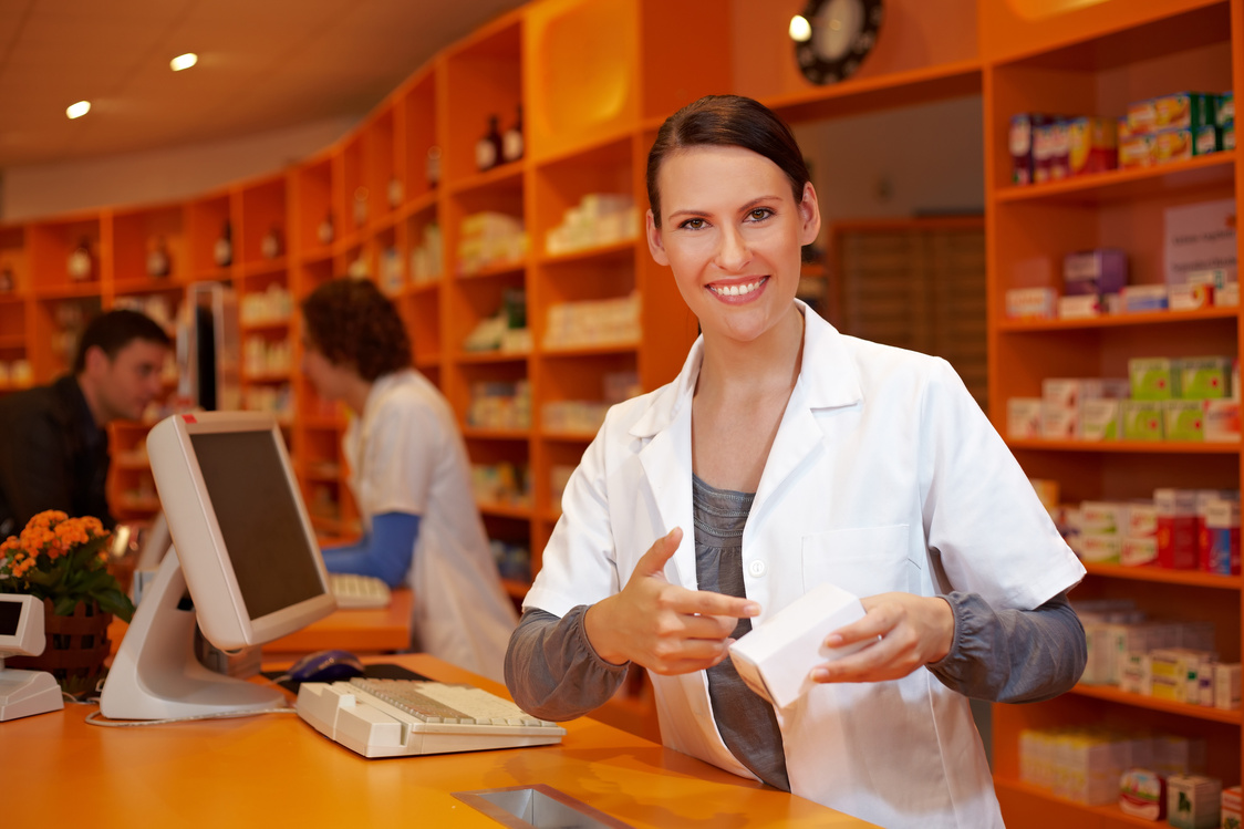 Pharmacist Pointing to Product